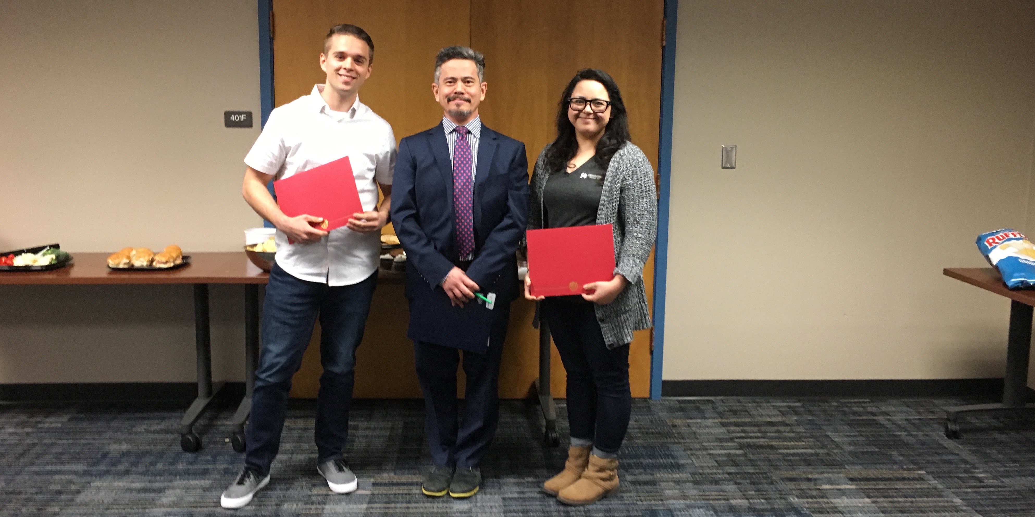 Student scholarship winner poses with faculty member